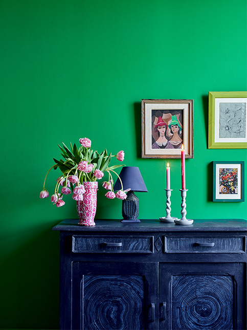 Blue Cupboard with Green Background - Beautiful Homes